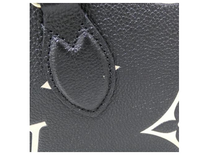 Borsa Louis Vuitton Bicolor Monogram Empreinte OnTheGo PM Nero Beige - vista 3