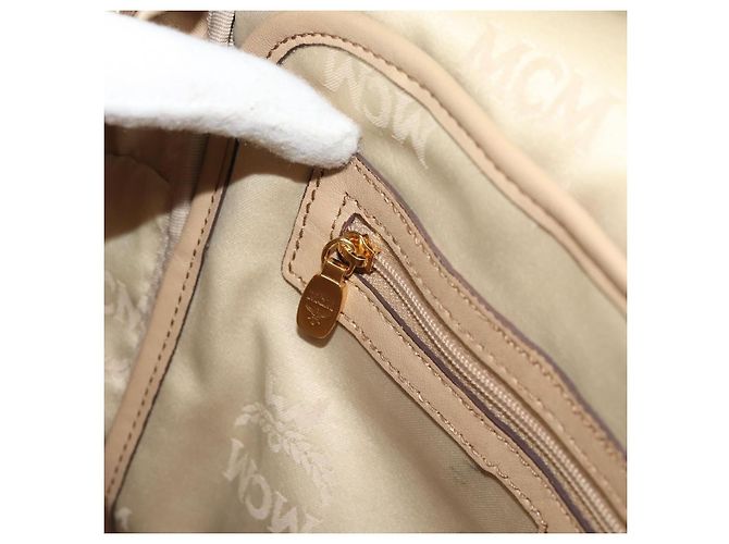 Zaino MCM Vicetos Logogram PVC Leather Beige Gold Auth 190802 D'oro - vista 24