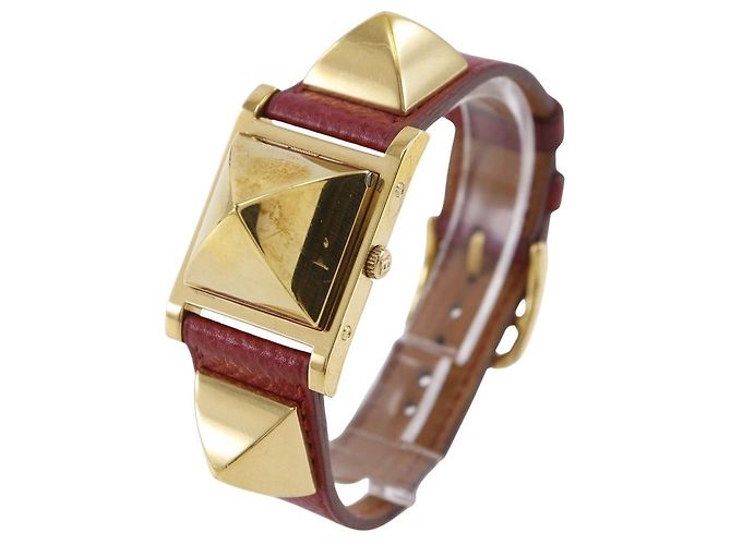 Reloj Hermès Medor Metal Dorado - vista 2