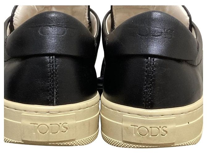 Sneakers con lacci e nappe in pelle Tod's Nero - vista 10