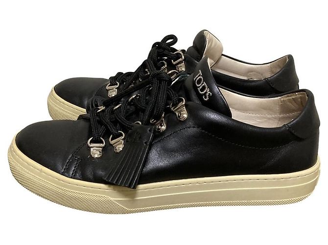 Sneakers con lacci e nappe in pelle Tod's Nero - vista 3