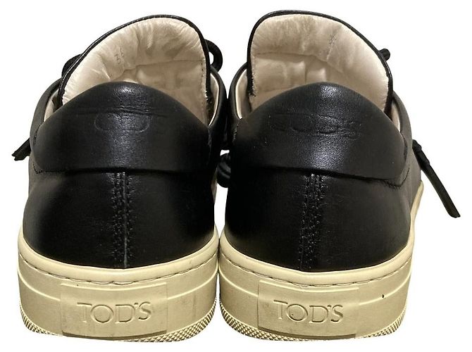 Sneakers con lacci e nappe in pelle Tod's Nero - vista 4