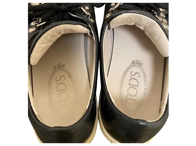 Sneakers con lacci e nappe in pelle Tod's Nero - vista 5