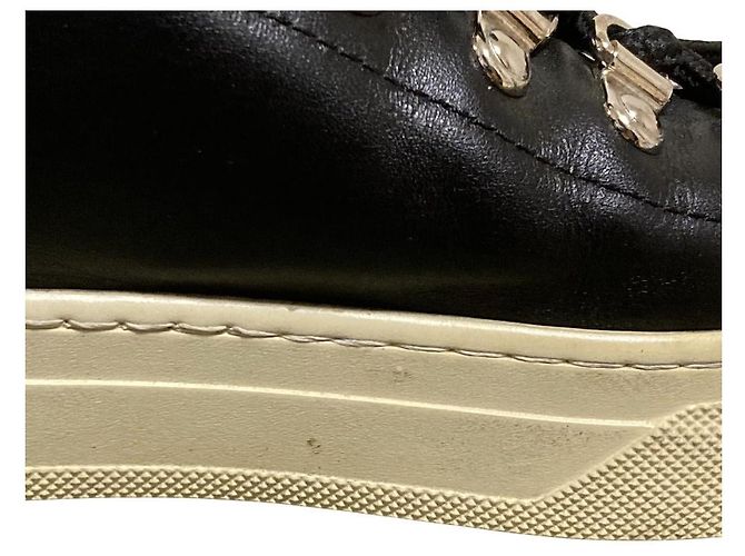 Sneakers con lacci e nappe in pelle Tod's Nero - vista 9