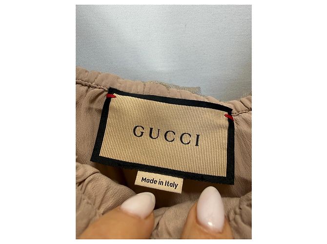 Gucci Set top a spalle scoperte e shorts in tulle beige - vista 2