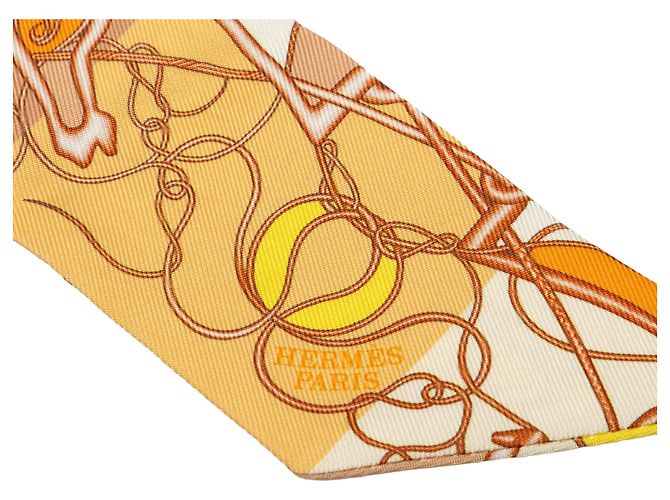 Sciarpa Twilly in seta Hermès Yellow Coup de Fouet au Bloc Giallo - vista 2