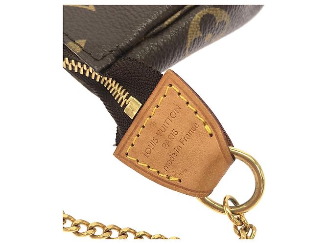 Louis Vuitton Mini Pochette Accessoires Pochette Accessori Monogram Marrone - vista 4