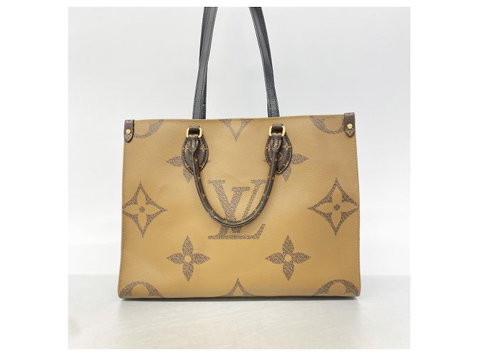 Borsa Tote Louis Vuitton Monogram Giant Reverse OnTheGo MM Marrone - vista 11