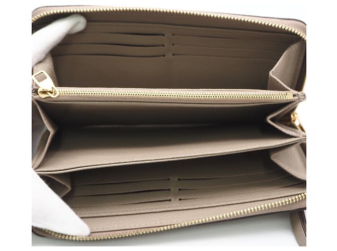 Louis Vuitton Monogram Empreinte Bicolor Zippy Wallet Beige - vista 11
