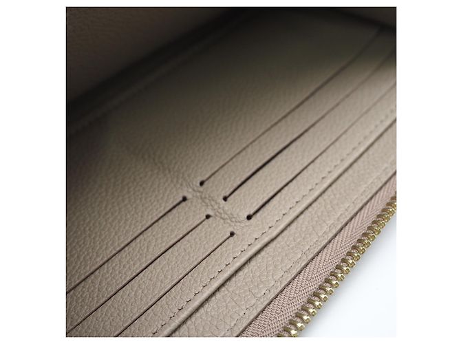 Louis Vuitton Monogram Empreinte Bicolor Zippy Wallet Beige - vista 13