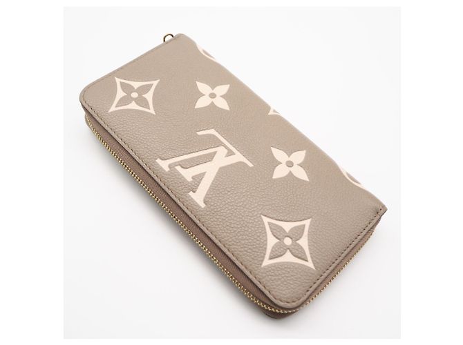 Louis Vuitton Monogram Empreinte Bicolor Zippy Wallet Beige - vista 2
