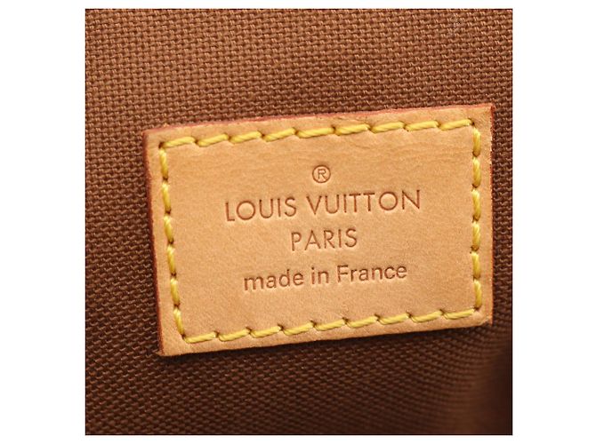 Borsa Louis Vuitton Tivoli GM Marrone Monogramma - vista 4