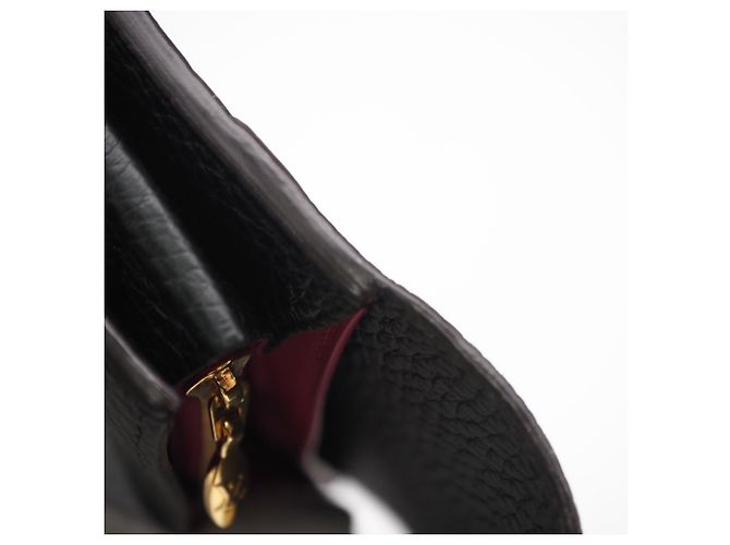 Capucines Louis Vuitton Taurillon Long Wallet aus schwarzem Leder - Ansicht 11