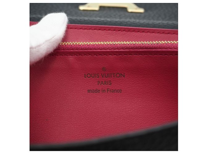 Capucines Louis Vuitton Taurillon Long Wallet aus schwarzem Leder - Ansicht 17