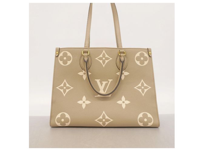 Borsa Tote Louis Vuitton Monogram Empreinte Bicolor OnTheGo MM Grigio Crudo - vista 12