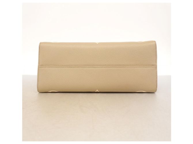 Borsa Tote Louis Vuitton Monogram Empreinte Bicolor OnTheGo MM Grigio Crudo - vista 3