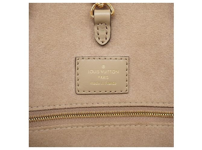 Borsa Tote Louis Vuitton Monogram Empreinte Bicolor OnTheGo MM Grigio Crudo - vista 5