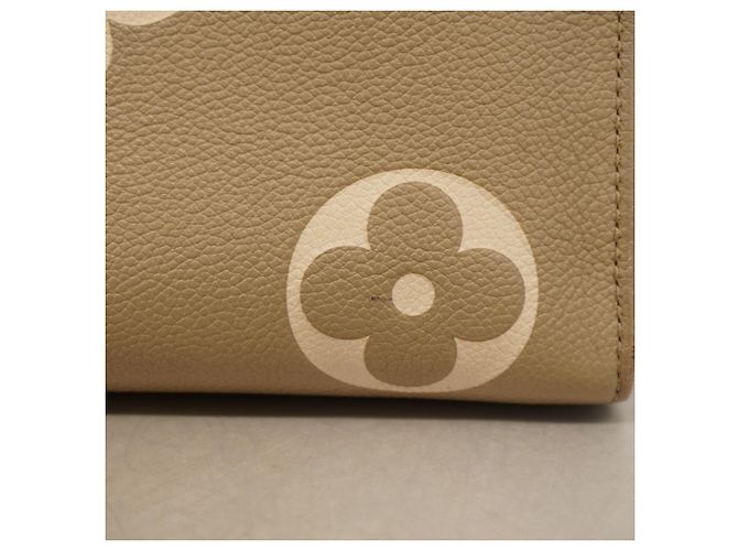 Borsa Tote Louis Vuitton Monogram Empreinte Bicolor OnTheGo MM Grigio Crudo - vista 7