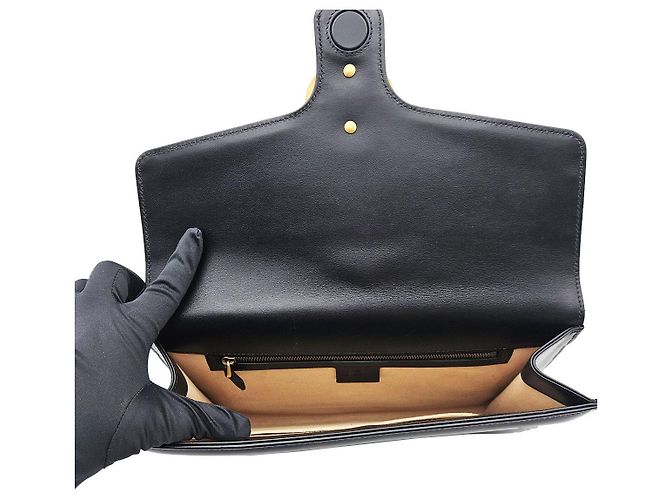 Gucci Clutch GG Marmont in pelle matelassé chevron nera e oro Nero - vista 7