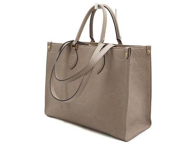 Louis Vuitton Bolso Tote Monogram Empreinte OnTheGo MM Castaño - vista 2