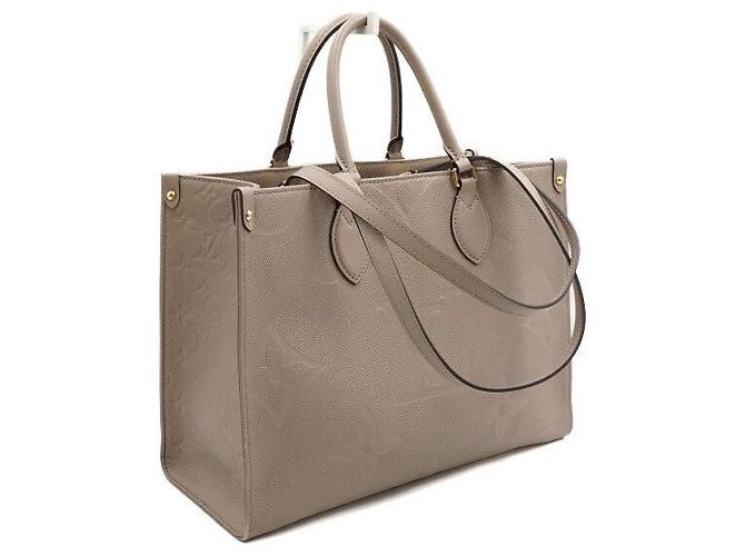 Louis Vuitton Bolso Tote Monogram Empreinte OnTheGo MM Castaño - vista 3