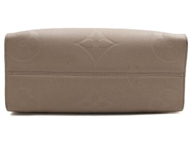Louis Vuitton Bolso Tote Monogram Empreinte OnTheGo MM Castaño - vista 6