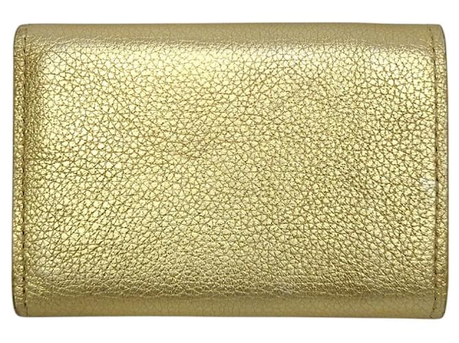 Louis Vuitton Cartera Compacta Lockmini Dorado - vista 2