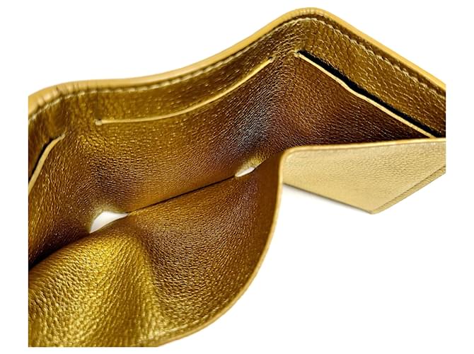 Louis Vuitton Cartera Compacta Lockmini Dorado - vista 6