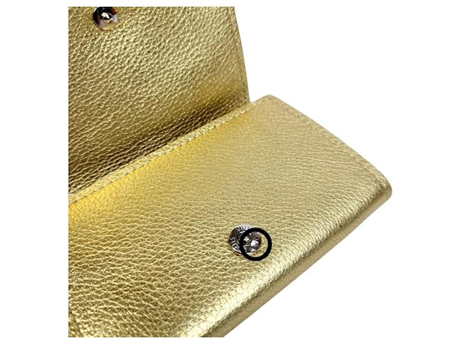 Louis Vuitton Cartera Compacta Lockmini Dorado - vista 7