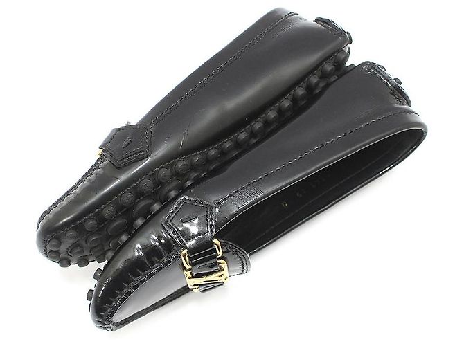 Louis Vuitton Mocassini da guida in vernice nera con logo LV dorato Nero - vista 6