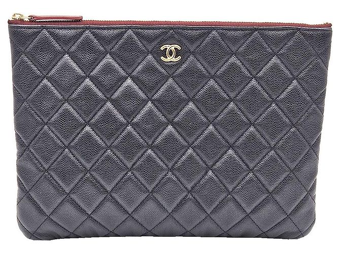 Chanel Clutch Classic New Medium in Caviar Nero e Oro - vista 2