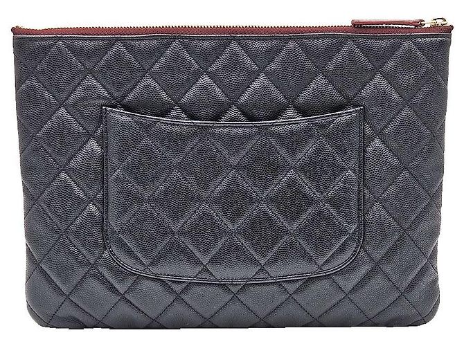 Chanel Clutch Classic New Medium in Caviar Nero e Oro - vista 4