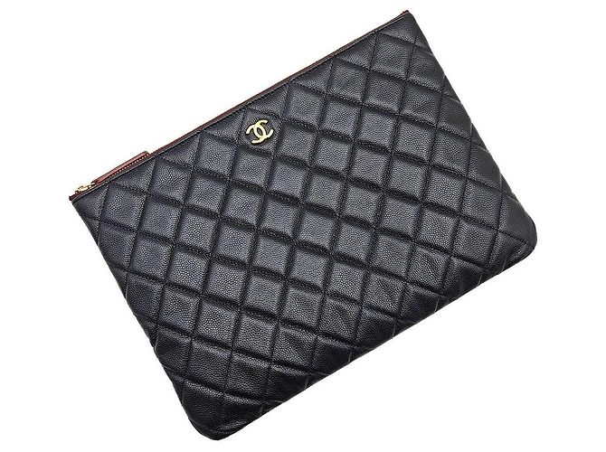 Chanel Clutch Classic New Medium in Caviar Nero e Oro - vista 5