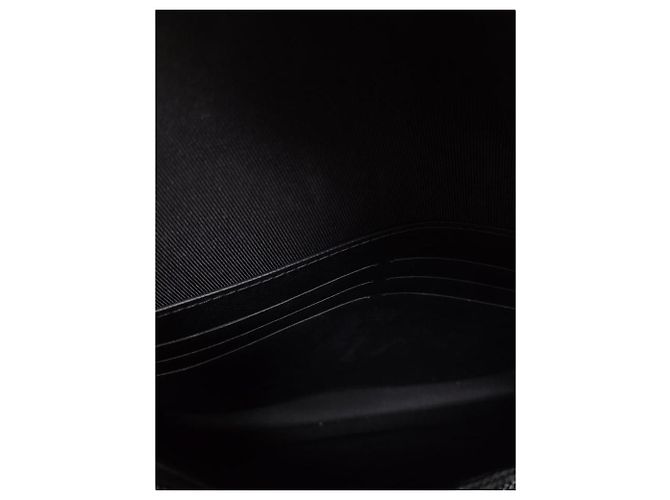 Louis Vuitton Clutch Monogram Lock - vista 4