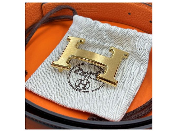 Hermès Cinturón reversible Negro/Oro mate Naranja - vista 3