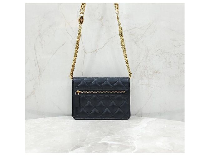 Chanel Mini bolso con solapa y cadena en piel de cordero negro y oro - vista 3