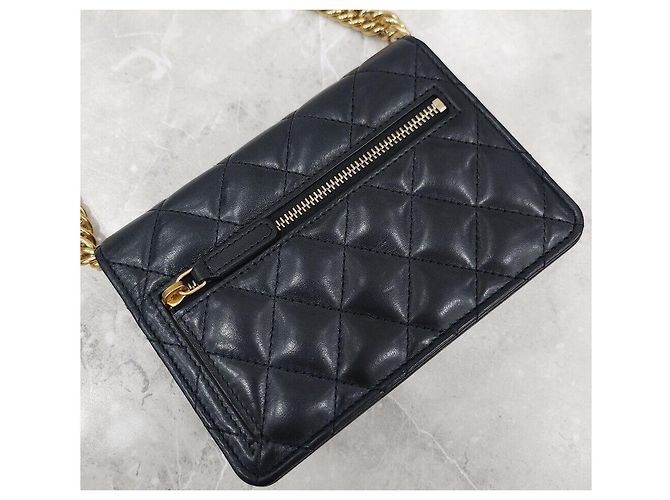 Chanel Mini bolso con solapa y cadena en piel de cordero negro y oro - vista 6