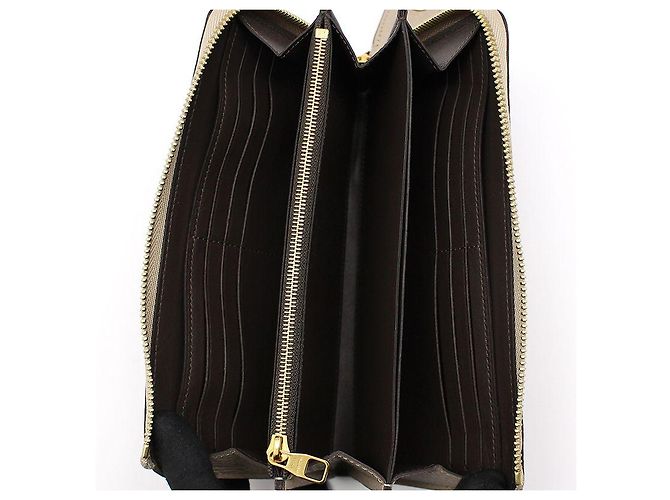 Louis Vuitton Cartera larga Comet Taurillon Zippy Castaño - vista 8