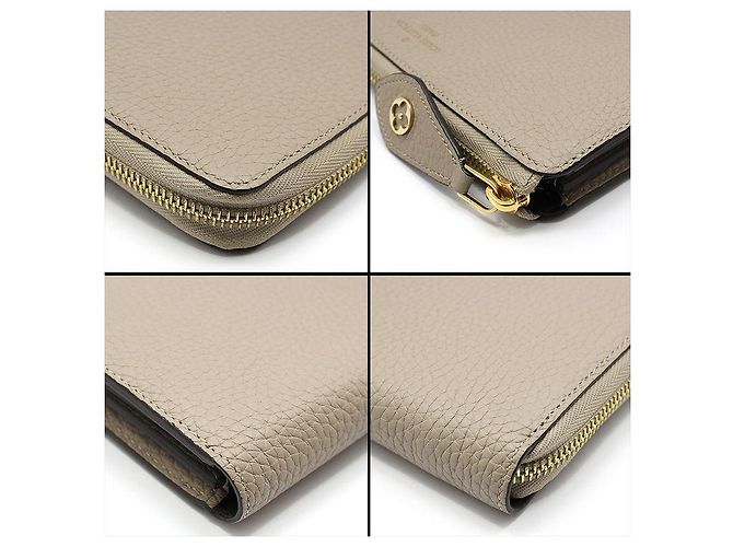Louis Vuitton Cartera larga Comet Taurillon Zippy Castaño - vista 9