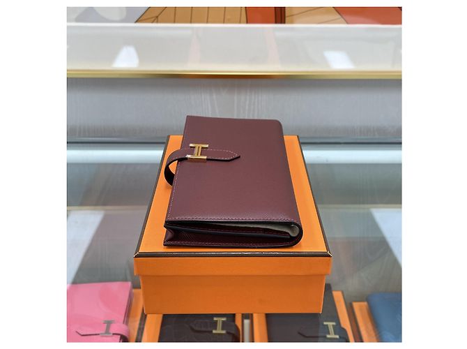 Hermès Lange Brieftasche Beige mit Goldprägung - Geschenk Rot - Ansicht 5