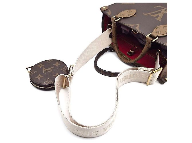 Louis Vuitton Monogram OnTheGo PM Marrom - vista 5