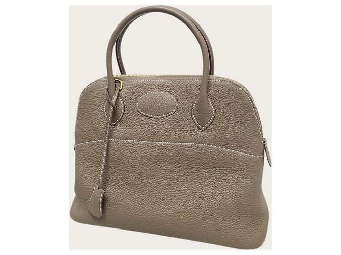 Hermès Clemence Bolide in Taupe con Hardware Oro Marrone - vista 4
