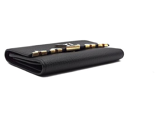 Louis Vuitton Cartera Compacta Capucines Negro - vista 5