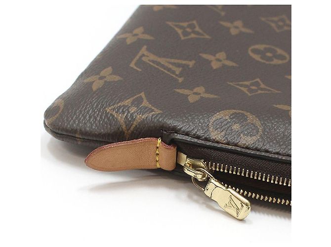 Louis Vuitton Clutch Monogram Etoile Voyage MM Marrone - vista 9