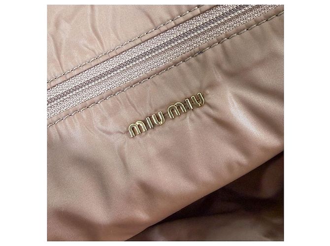 Miu Miu Borsa a tracolla in pelle morbida con catena logo da donna Cammeo Beige Arancione - vista 11