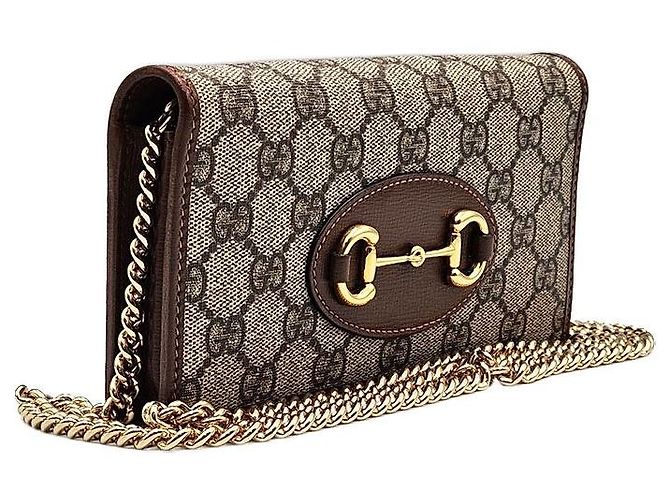 Horsebit 1955 Gucci Portafoglio lungo a tracolla GG Supreme Canvas con bordi in pelle marrone e catena Horsebit - vista 4
