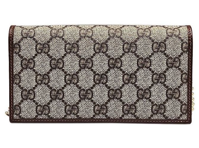 Horsebit 1955 Gucci Portafoglio lungo a tracolla GG Supreme Canvas con bordi in pelle marrone e catena Horsebit - vista 5