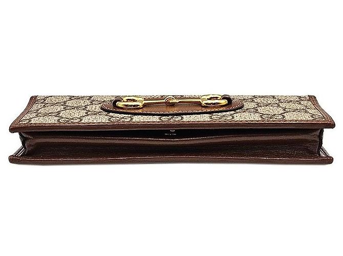 Horsebit 1955 Gucci Portafoglio lungo a tracolla GG Supreme Canvas con bordi in pelle marrone e catena Horsebit - vista 7