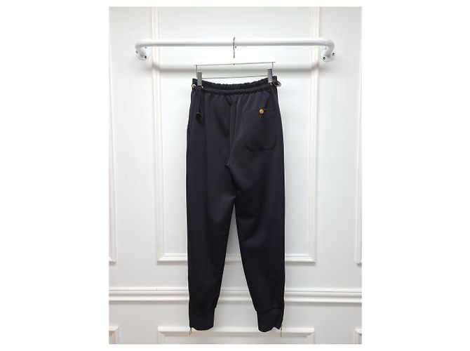 Louis Vuitton Pantaloni Jogger con Cerniera Laterale e Bottoni Oro Nero - vista 3