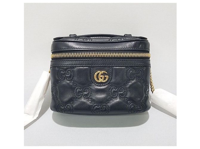 Gucci Mini borsa a tracolla con catena e manico superiore in matelassé GG - vista 2
